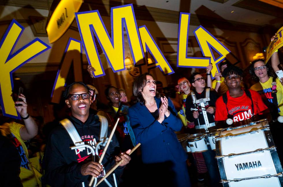 U.S. Sen. Kamala Harris, D-Calif., is welcomed by the Gibson Middle School drumline before the ...
