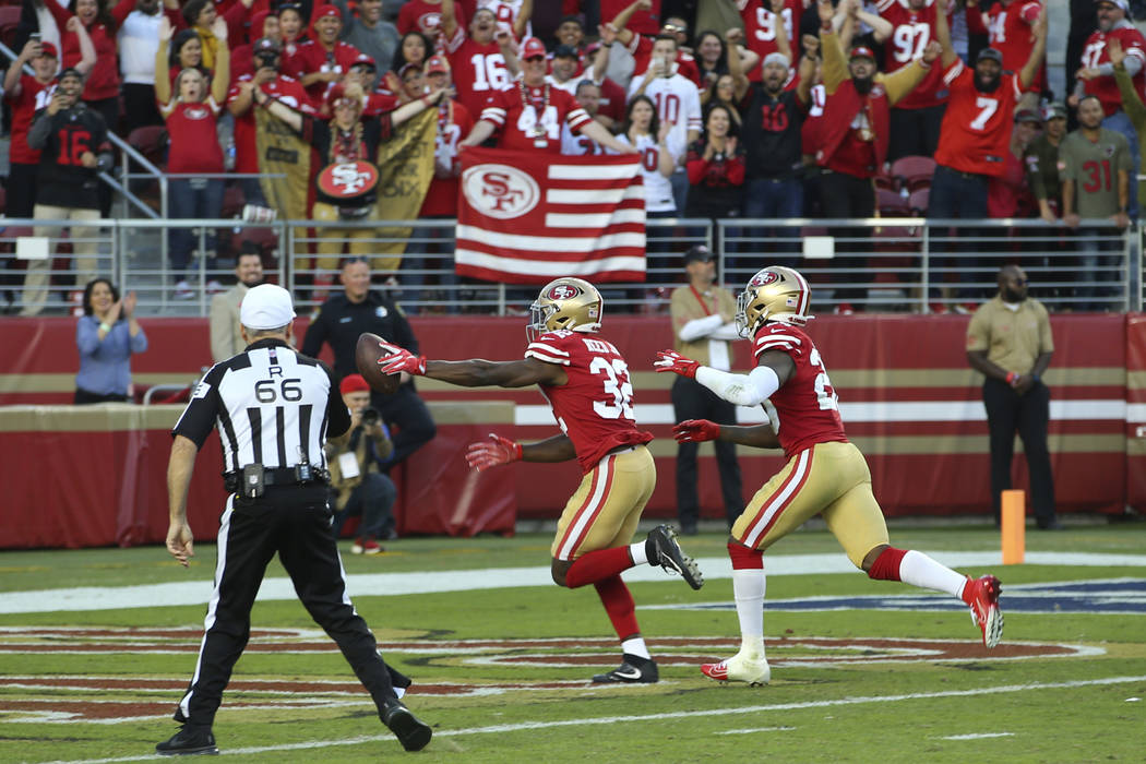 San Francisco 49ers free safety D.J. Reed Jr. (32) returns a fumble to score against the Arizon ...
