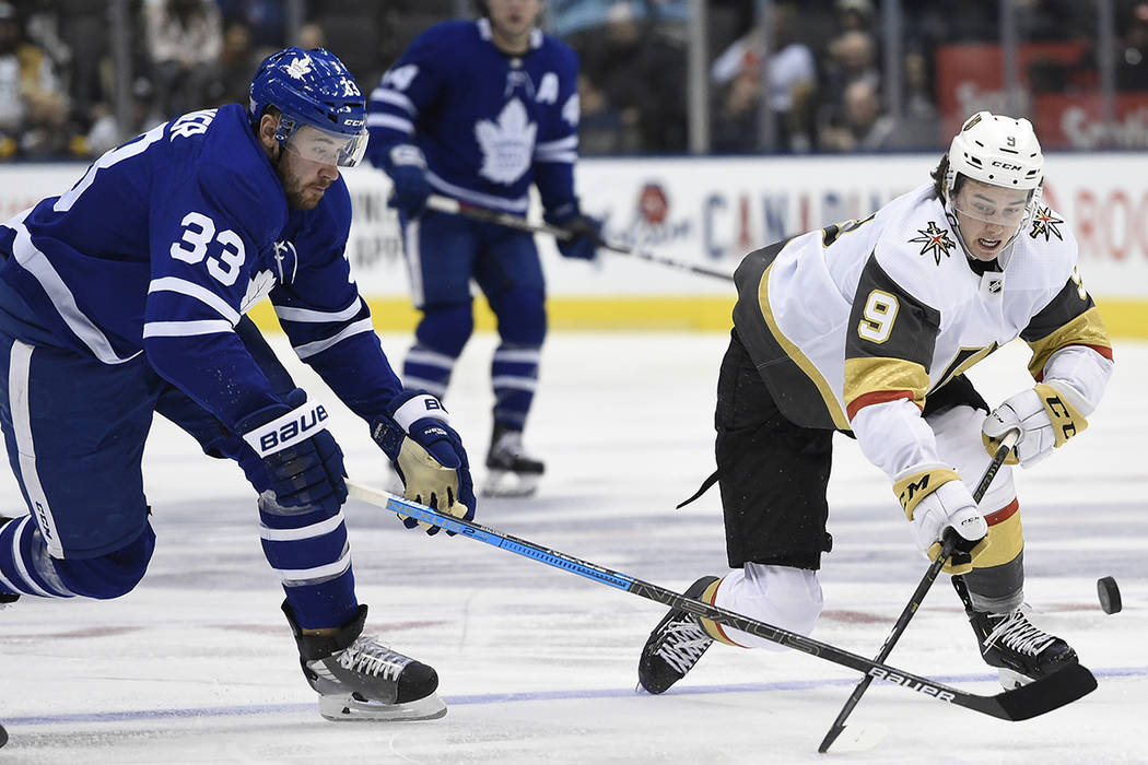 Vegas Golden Knights centre Cody Glass (9) and Toronto Maple Leafs center Frederik Gauthier (33 ...