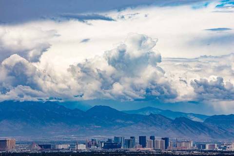A view from Henderson of the Las Vegas Strip. Monday will be sunny and warm but rain is expecte ...