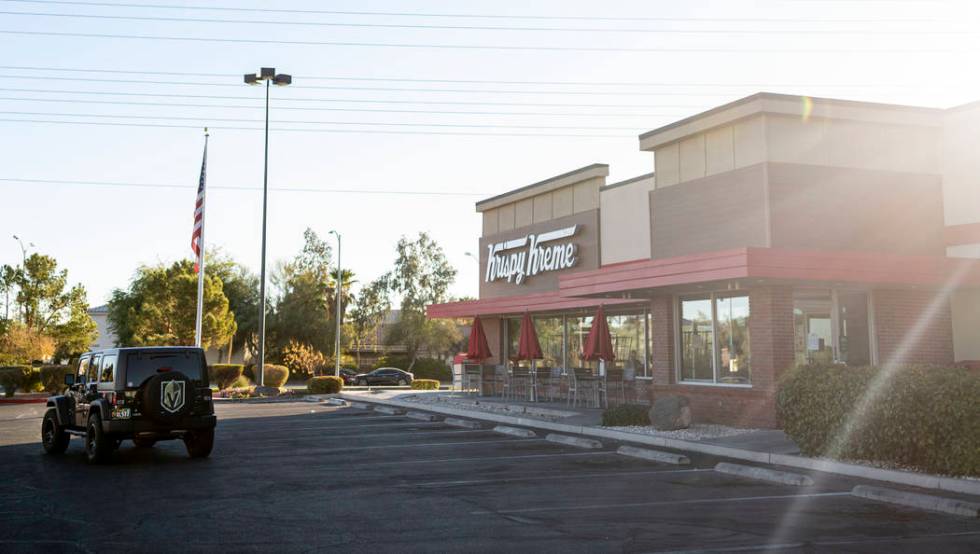 Golden Knight fans drive up to the Krispy Kreme store at 9791 S. Eastern Ave. in Henderson on M ...