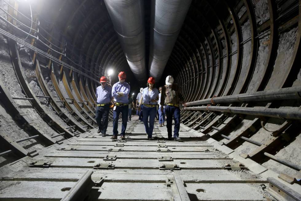 U.S. Sen. Catherine Cortez Masto, D-Nev., talks with Steve Frishman, a technical consultant to ...