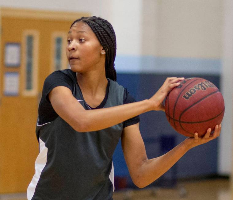 Centennial junior Taylor Bigby, participates in drills during varsity practice at Centennial hi ...