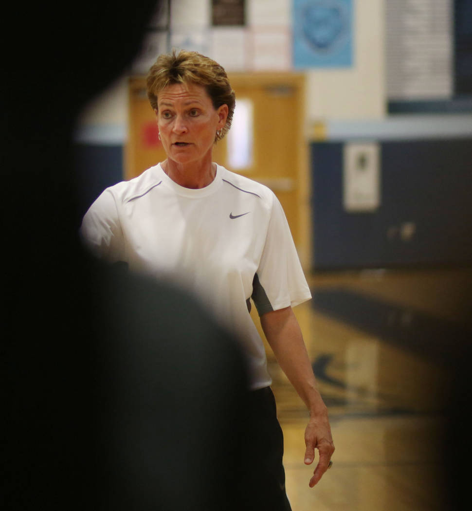 Centennial's head coach Karen Weitz speaks with the varsity girls team during practice at Cente ...