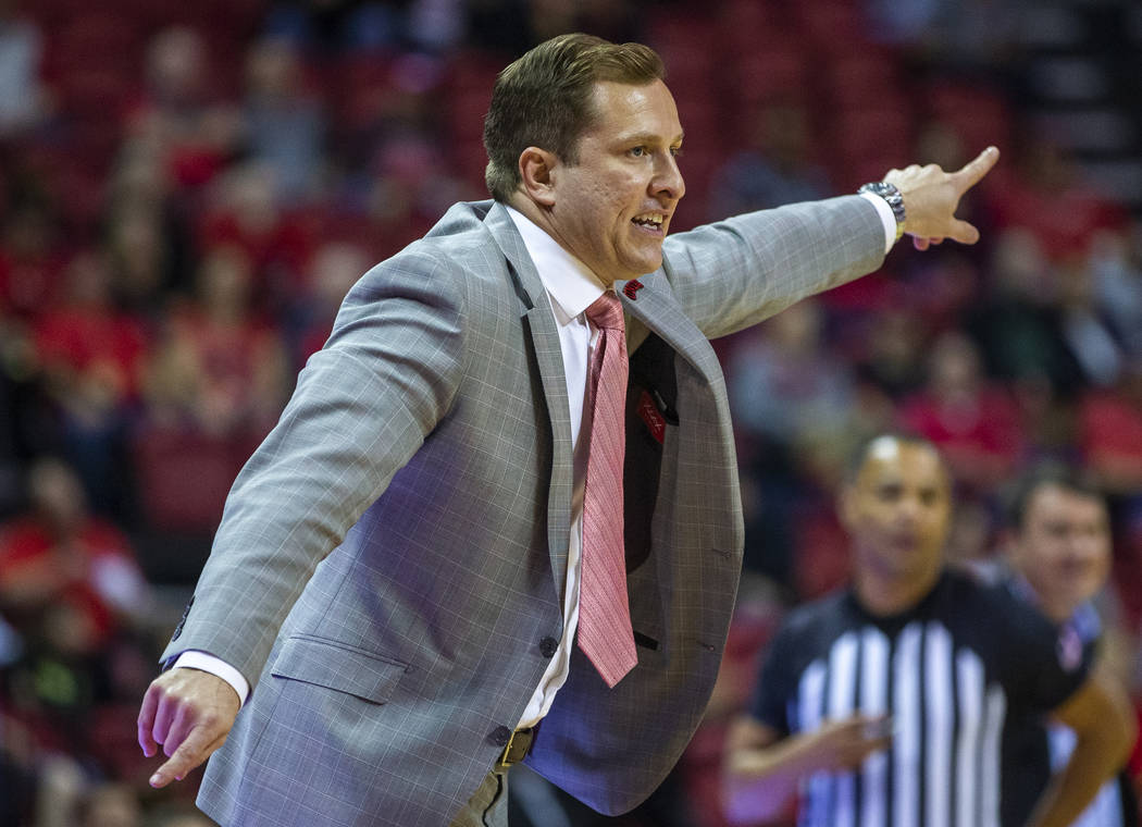 UNLV Rebels head coach T.J.Otzelberger directs his defense versus the Abilene Christian Wildcat ...