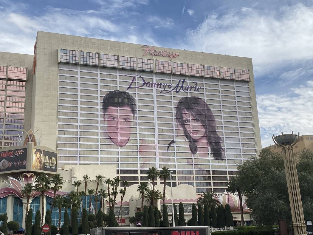 The famed Flamingo Donny & Marie building wrap is shown overlooking the Strip on Tuesday, Nov. ...
