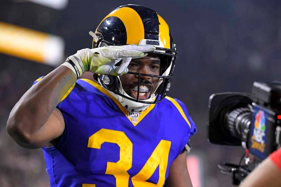 Los Angeles Rams running back Malcolm Brown celebrates after scoring against the Chicago Bears ...