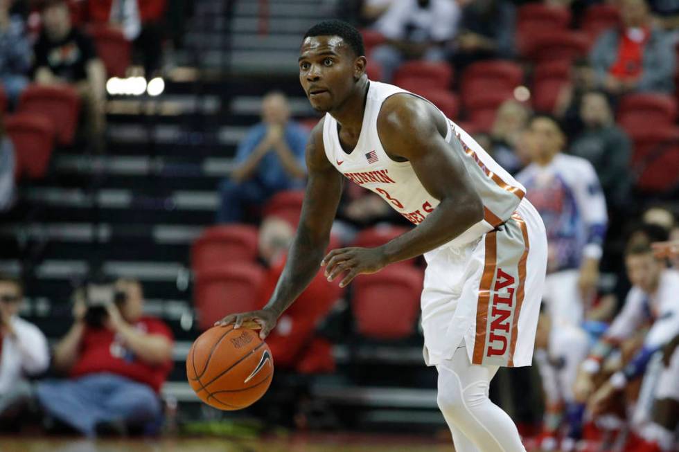 UNLV's Amauri Hardy (3) plays against Kansas State in an NCAA college basketball game Saturday, ...