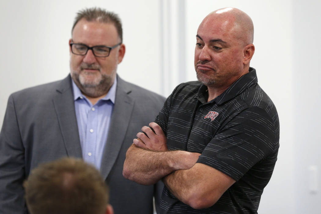 UNLV football head coach Tony Sanchez, right, is seen with Mark Wallington, senior assistant at ...