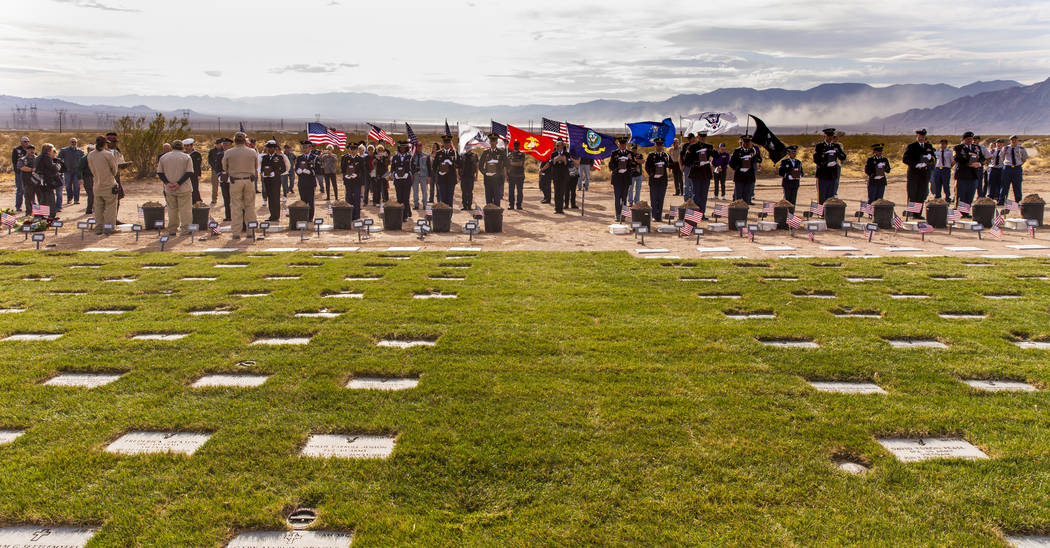 Urns arrive by honorable transfer to their burial plots during the third Missing in Nevada cere ...