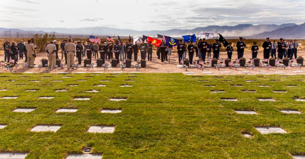 Urns arrive by honorable transfer to their burial plots during the third Missing in Nevada cere ...