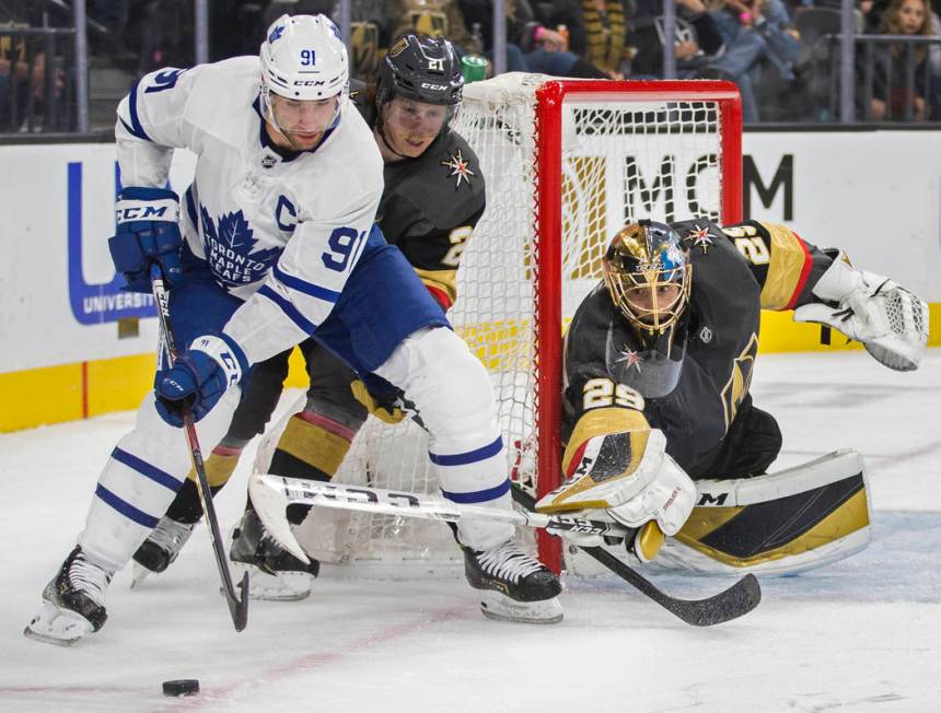 Vegas Golden Knights goaltender Marc-Andre Fleury (29) makes a poke save against Toronto Maple ...