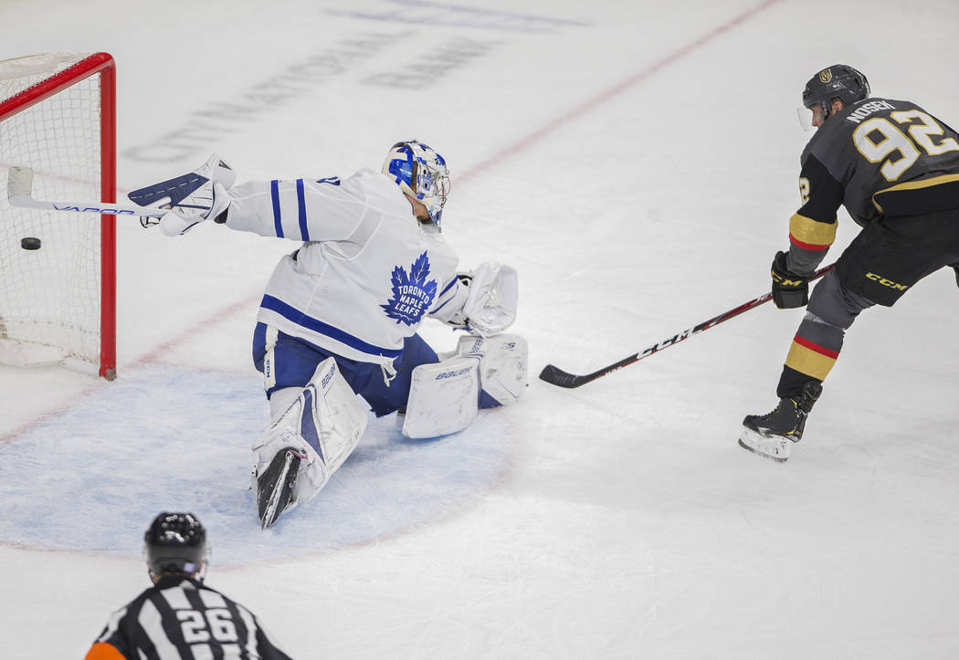 Vegas Golden Knights left wing Tomas Nosek (92) scores against Toronto Maple Leafs goaltender F ...