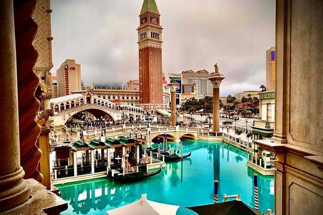 Clouds hang over the Las Vegas Valley, as seen from The Venetian on the Las Vegas Strip, Wednes ...