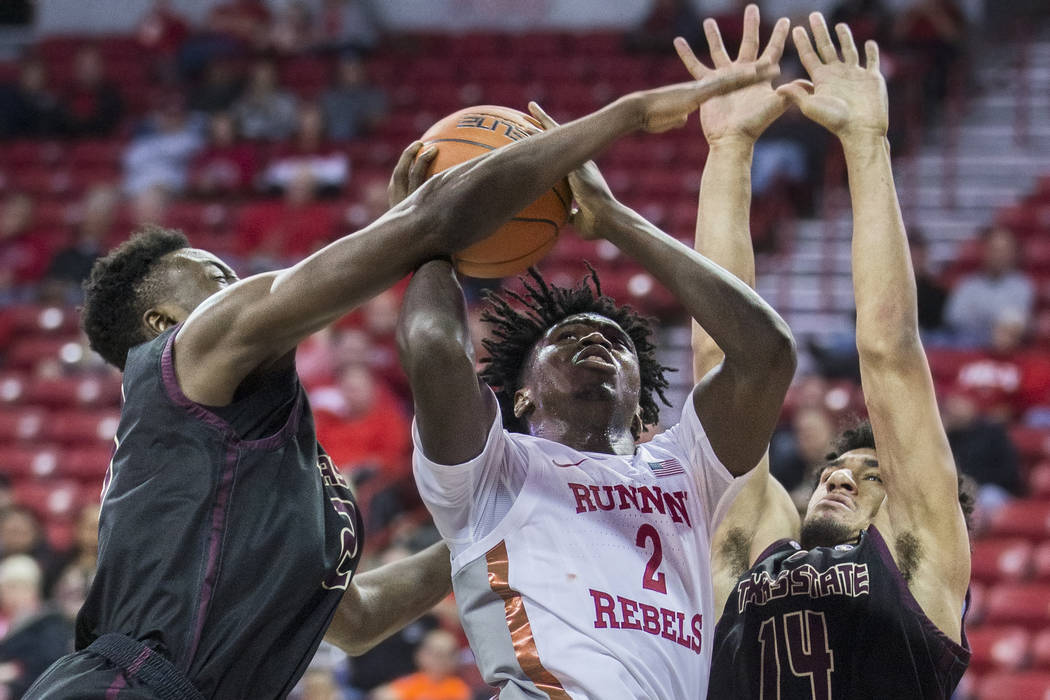 UNLV Rebels forward Donnie Tillman (2) drives to the rim past Texas State Bobcats forward Quent ...