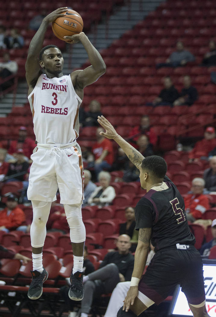 UNLV Rebels guard Amauri Hardy (3) shoots a three point shot over Texas State Bobcats guard Mar ...