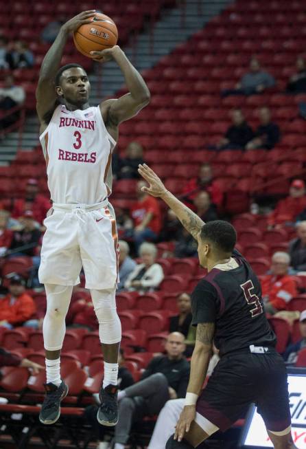 UNLV Rebels guard Amauri Hardy (3) shoots a three point shot over Texas State Bobcats guard Mar ...