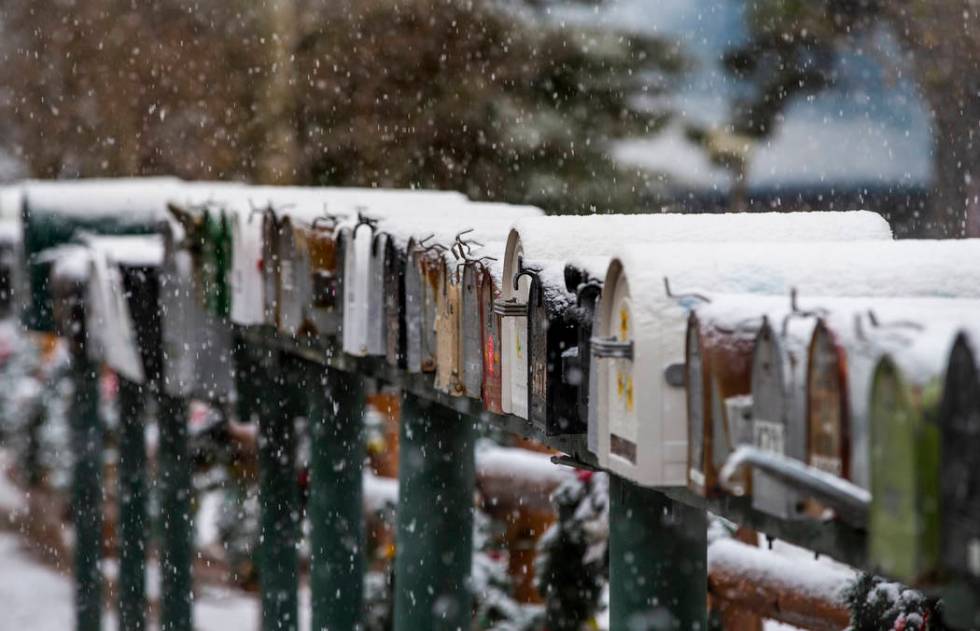 Snow covered mailboxes in Old Town at Mount Charleston on Wednesday, Nov. 20, 2019. (L.E. Basko ...