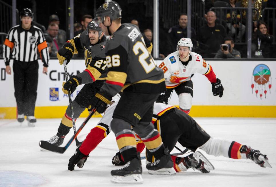 Golden Knights defenseman Shea Theodore (27) makes a shot on goal during the third period of th ...