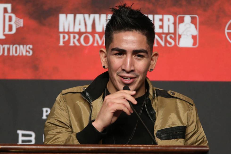 Leo Santa Cruz speaks during a press conference at the MGM Grand Garden Arena in Las Vegas, Wed ...