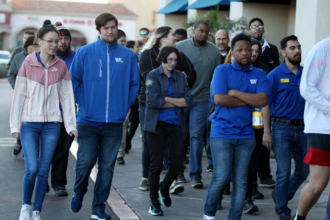 Best Buy employees prepare for Black Friday during a training event lead by General Manager Ant ...