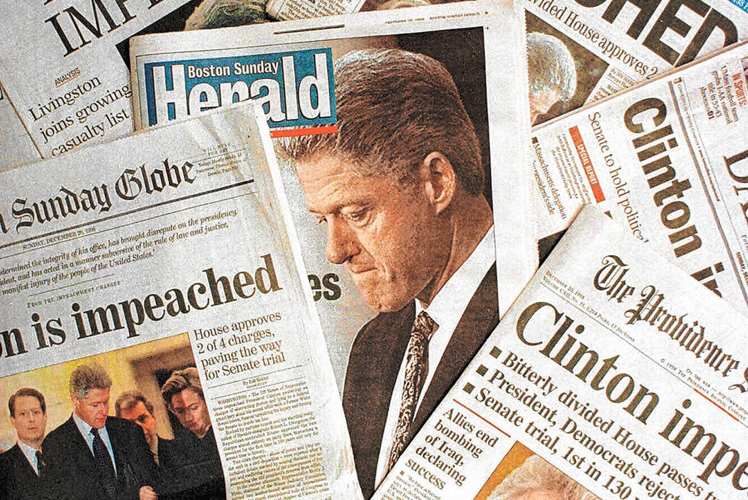 This is a photo montage showing the Sunday, Dec. 20, 1998 editions of newspapers from Massachus ...