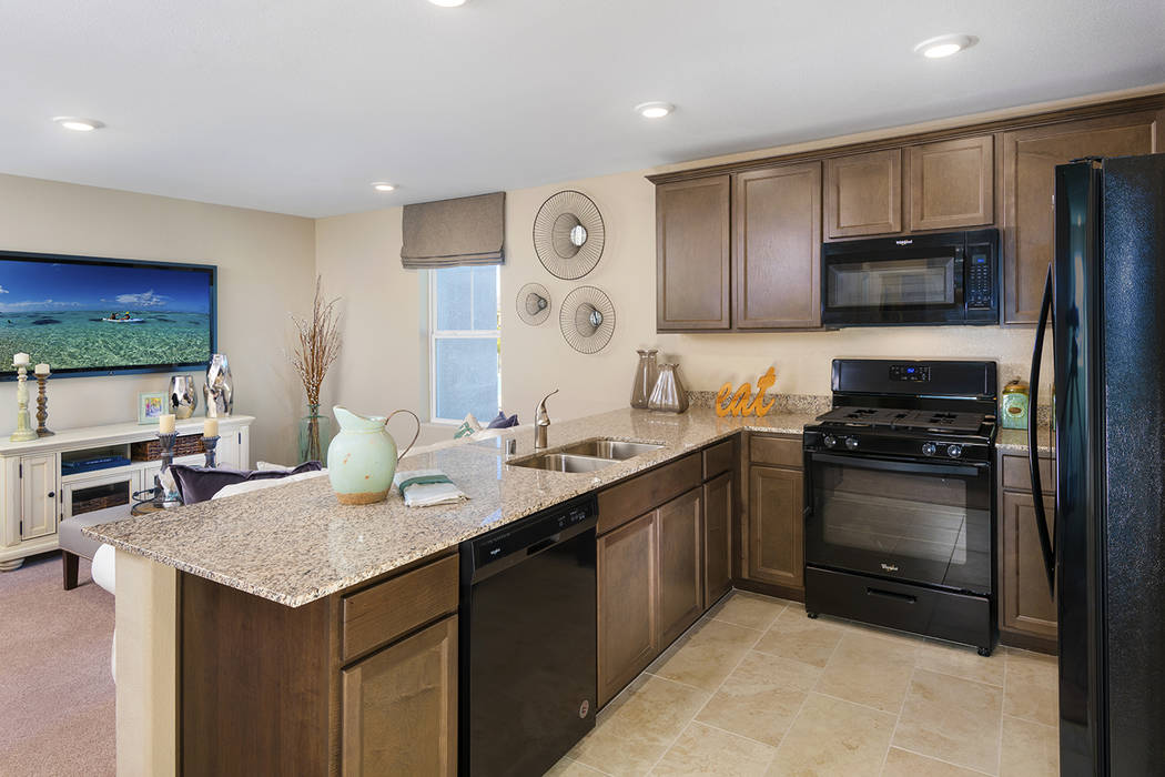 The Griffin town home offers a well-equipped kitchen off the great room. (Mark Skalny Beazer Homes)