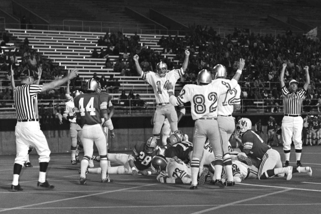 Historical images from the Las Vegas Review-Journal archive document the first UNLV football ga ...