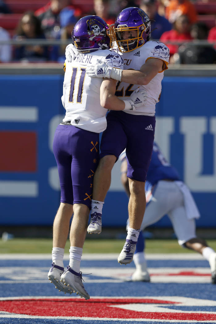 East Carolina receivers Tyler Snead, right, and Blake Proehl (11) celebrate after Snead caught ...