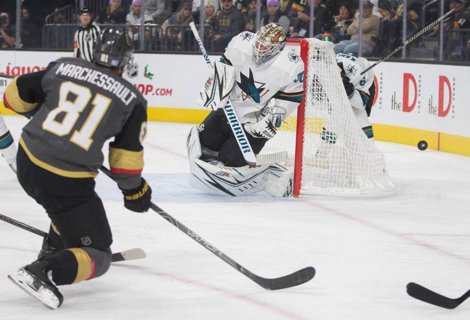 Vegas Golden Knights center Jonathan Marchessault (81) shoots on San Jose Sharks goaltender Aar ...