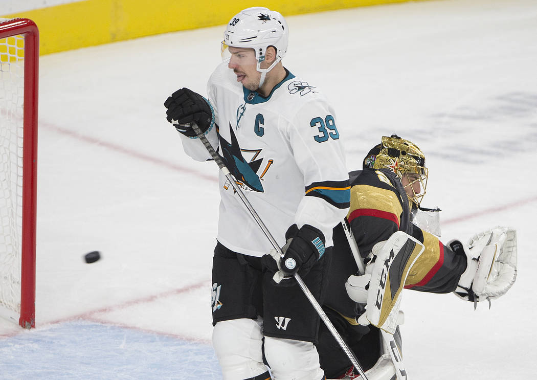 San Jose Sharks center Logan Couture (39) shoots on Vegas Golden Knights goaltender Marc-Andre ...