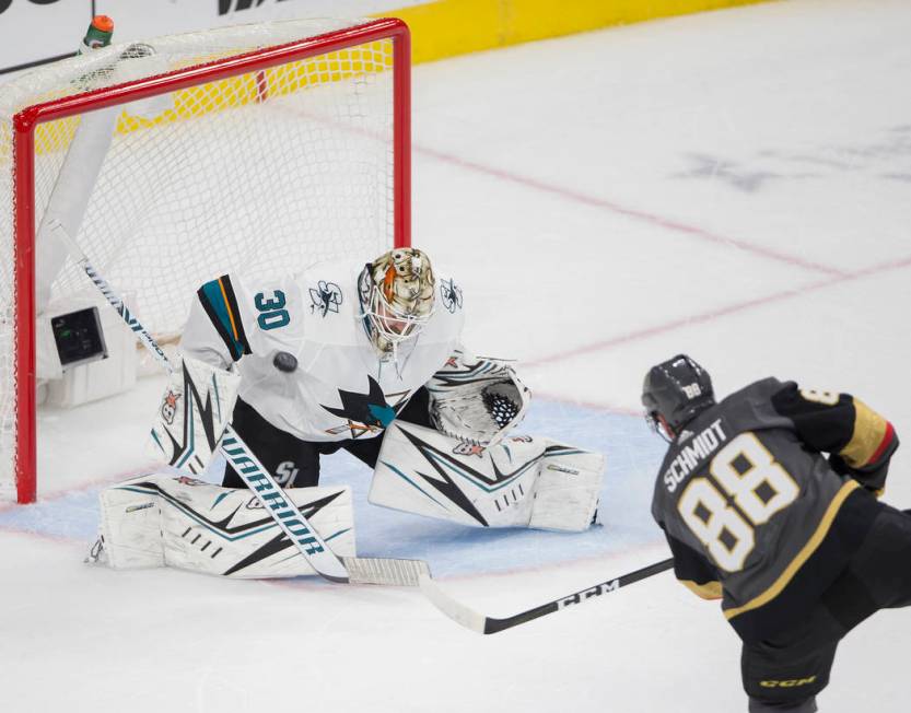 Vegas Golden Knights defenseman Nate Schmidt (88) shoots on San Jose Sharks goaltender Aaron De ...