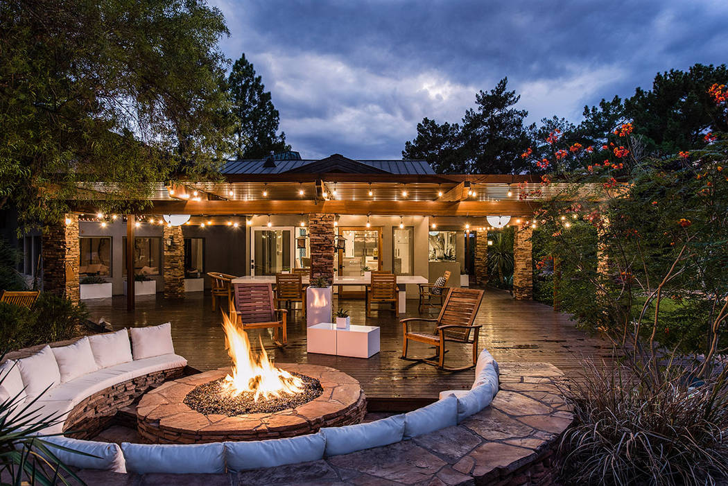 The main house's patio features a large fire pit. (Simply Vegas)