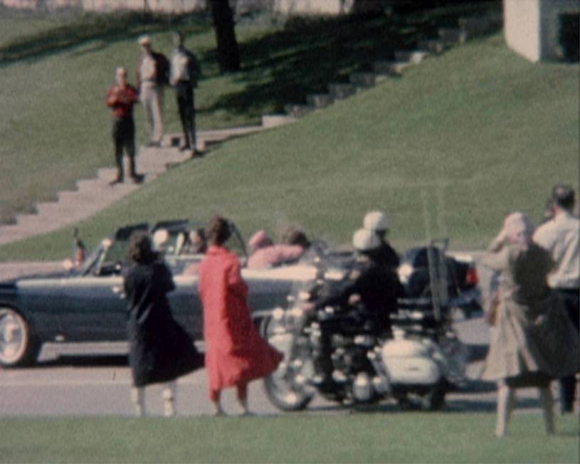 First Lady Jacqueline Kennedy cradles her husband President John F. Kennedy seconds after he wa ...