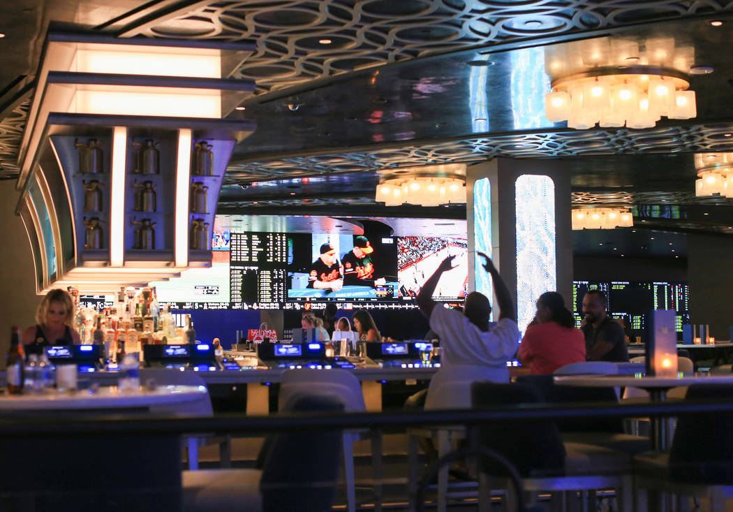 A newly renovated sports book can be seen from BLVD & MAIN Taphouse at The STRAT hotel-casino i ...