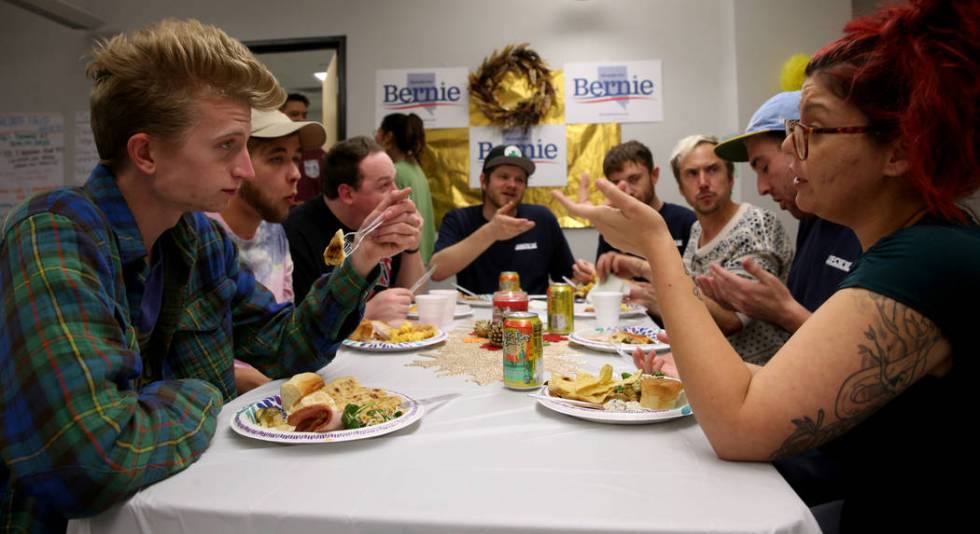 Campaign workers, from left, and Hudson Villeneuve of Ypsilanti, Mich. Jesse Archer of Niles, ...