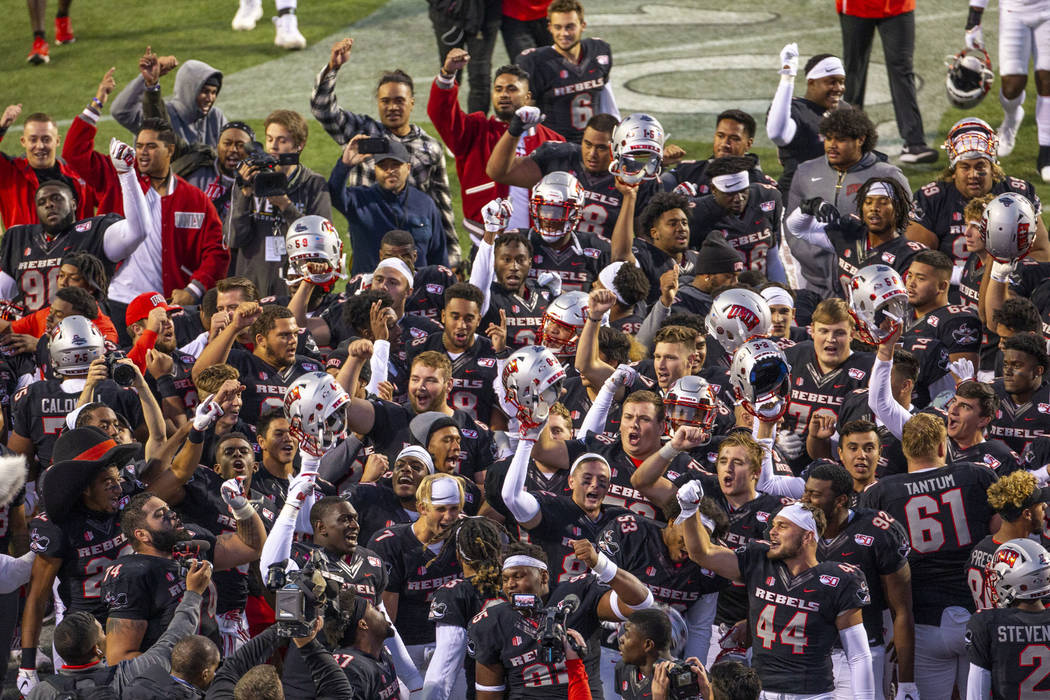 The UNLV Rebels come together in the end zone to celebrate their win over the San Jose State Sp ...