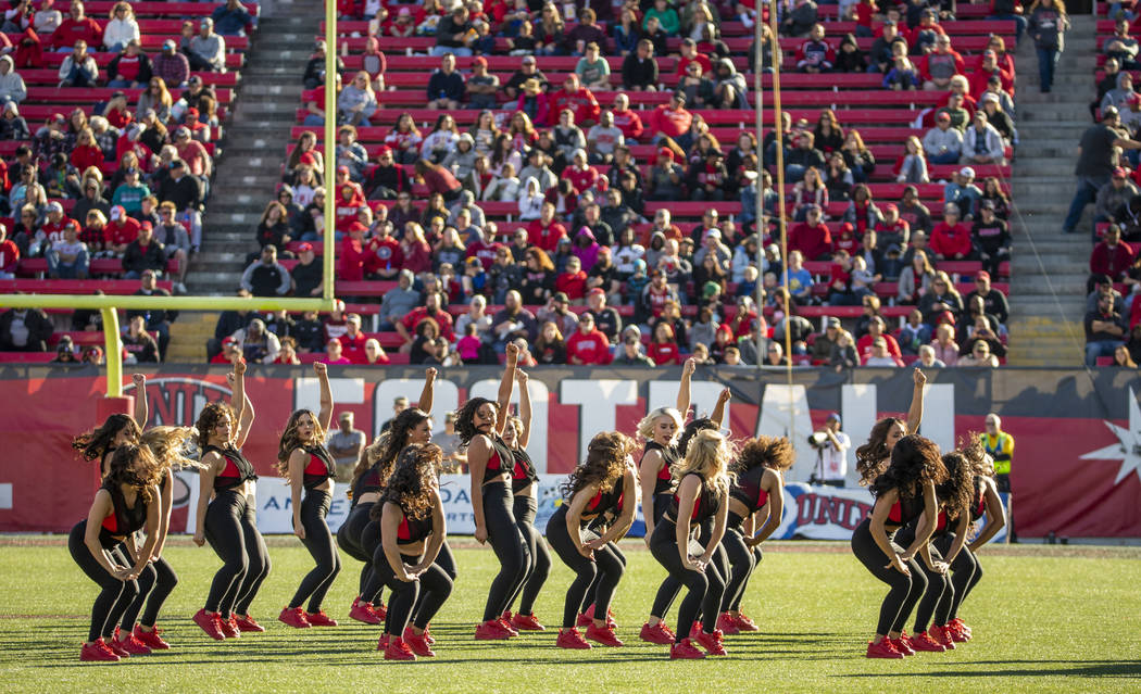 The Rebel Girls perform for the crowd as their team faces the San Jose State Spartans during th ...