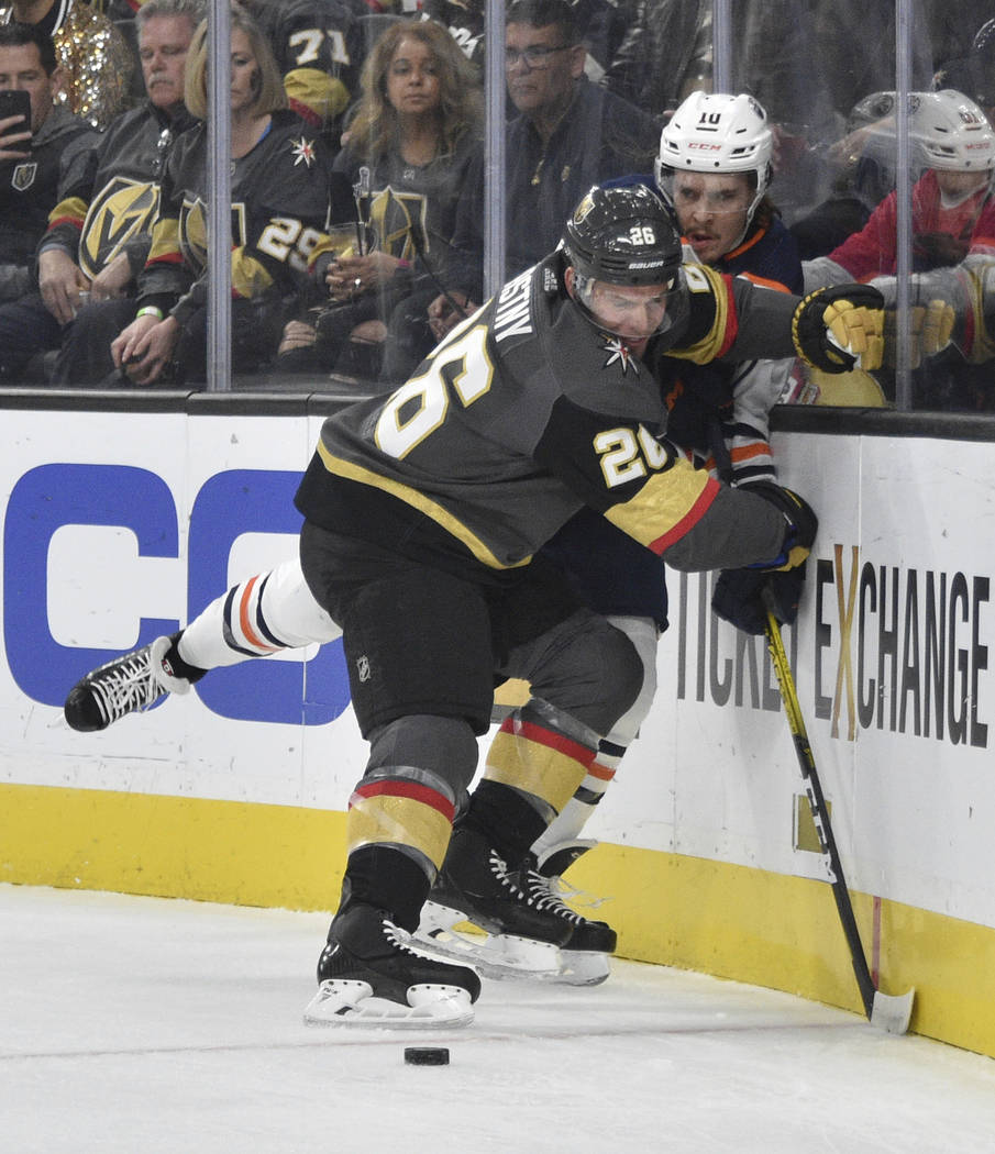 Vegas Golden Knights center Paul Stastny (26) checks Edmonton Oilers left wing Joakim Nygard ag ...