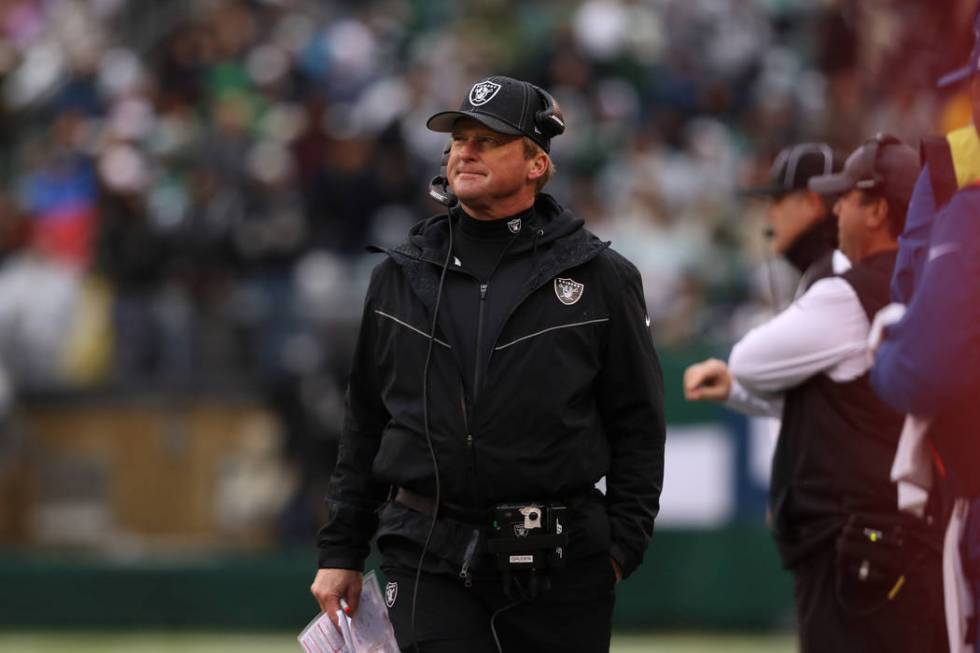 Oakland Raiders head coach Jon Gruden looks to the scoreboard during the first half of an NFL g ...