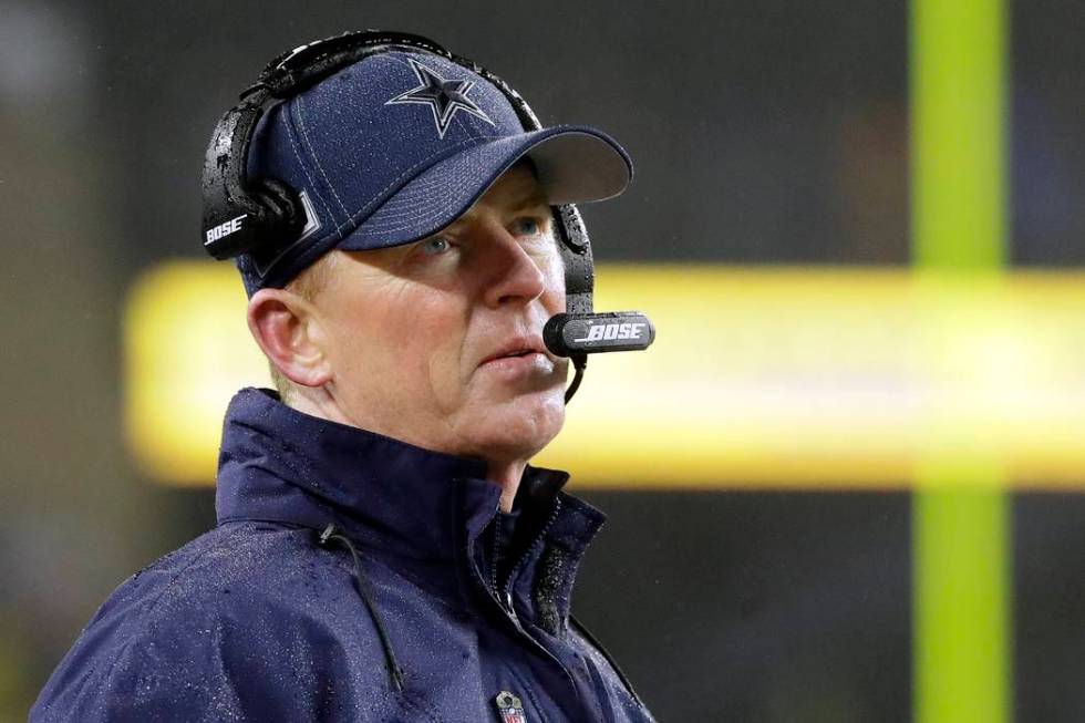 Dallas Cowboys head coach Jason Garrett watches from the sideline in the second half of an NFL ...