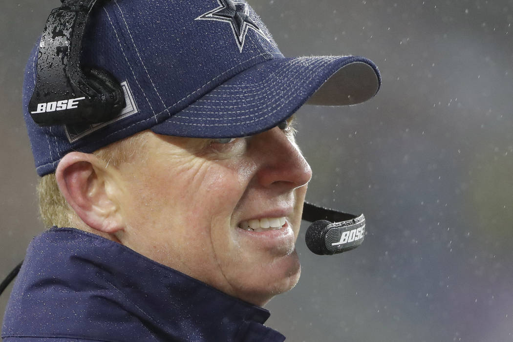 Dallas Cowboys head coach Jason Garrett watches from the sideline in the second half of an NFL ...