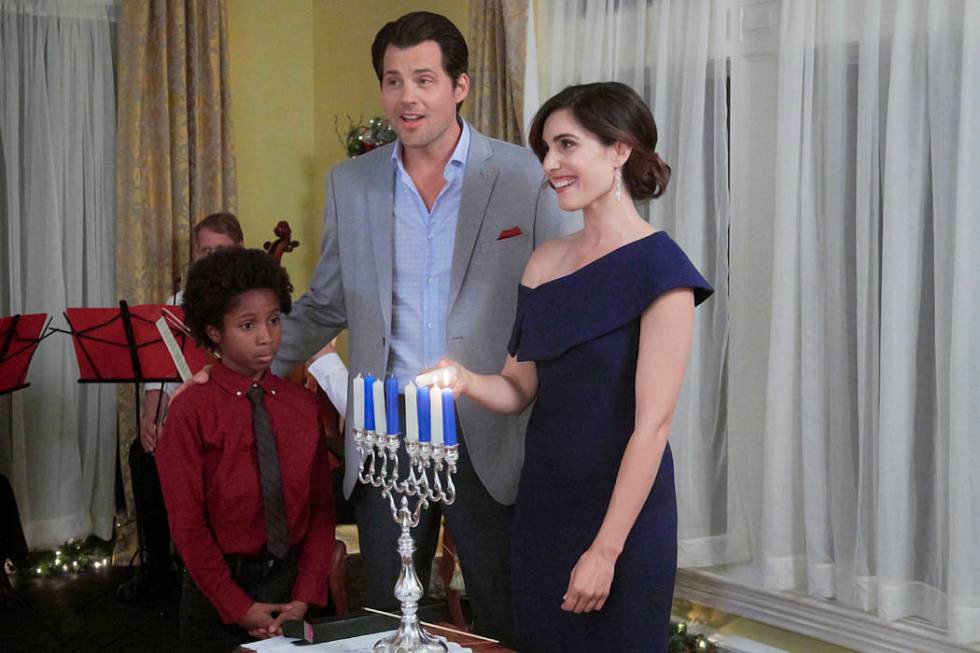 In "Double Holiday," career-minded Rebecca’s plans for Hanukkah go askew when a promotion opp ...