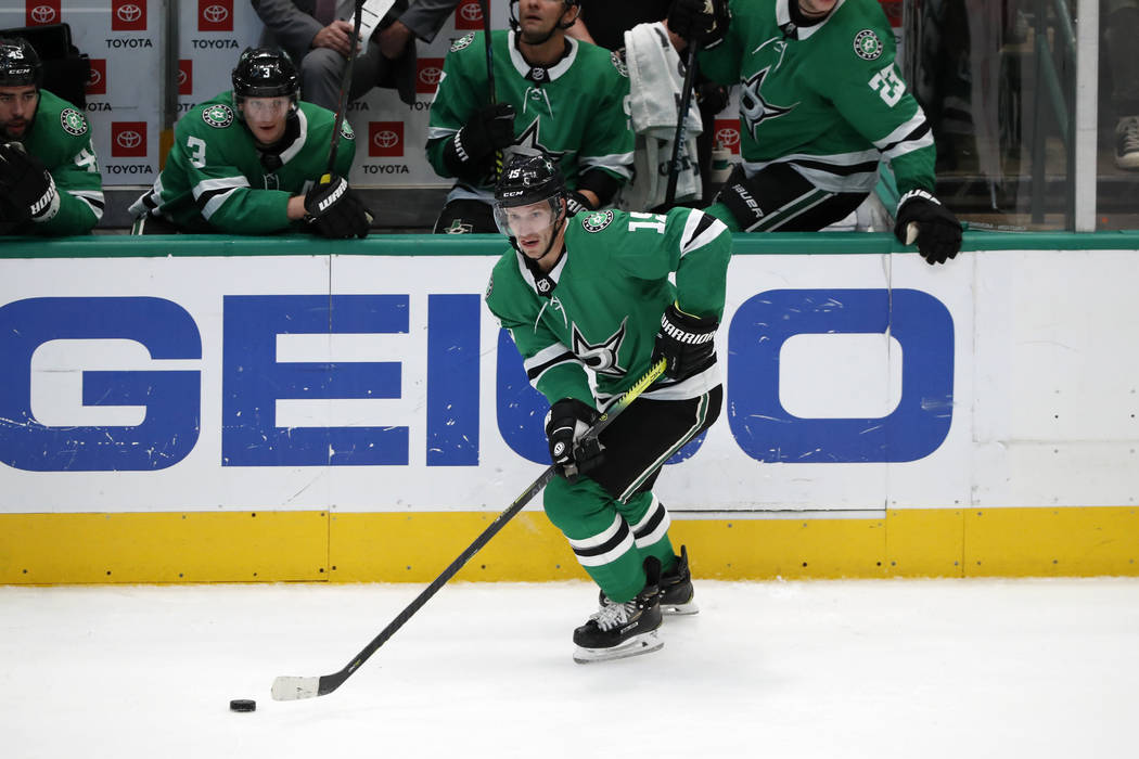 Dallas Stars left wing Blake Comeau (15) handles the puck in the third period of an NHL hockey ...