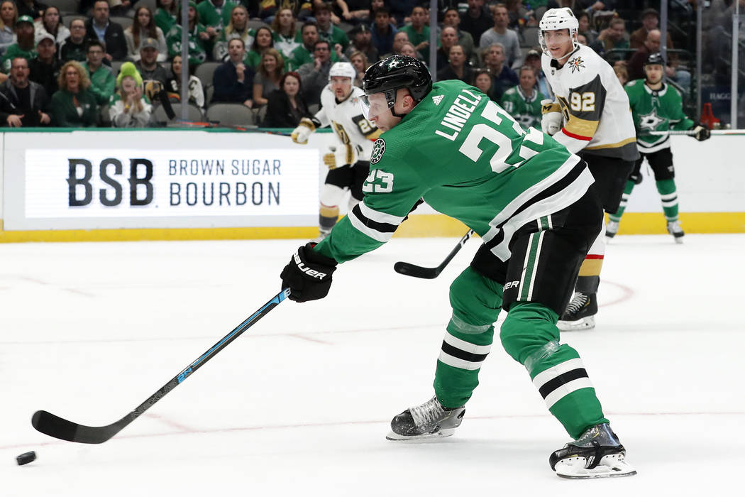 Dallas Stars defenseman Esa Lindell (23) takes a shot at the net and scores as Vegas Golden Kni ...