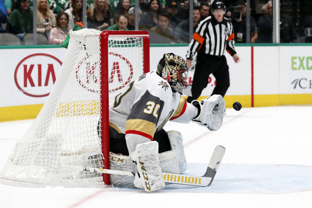 Vegas Golden Knights goaltender Malcolm Subban (30) reaches out to glove a shot from the Dallas ...