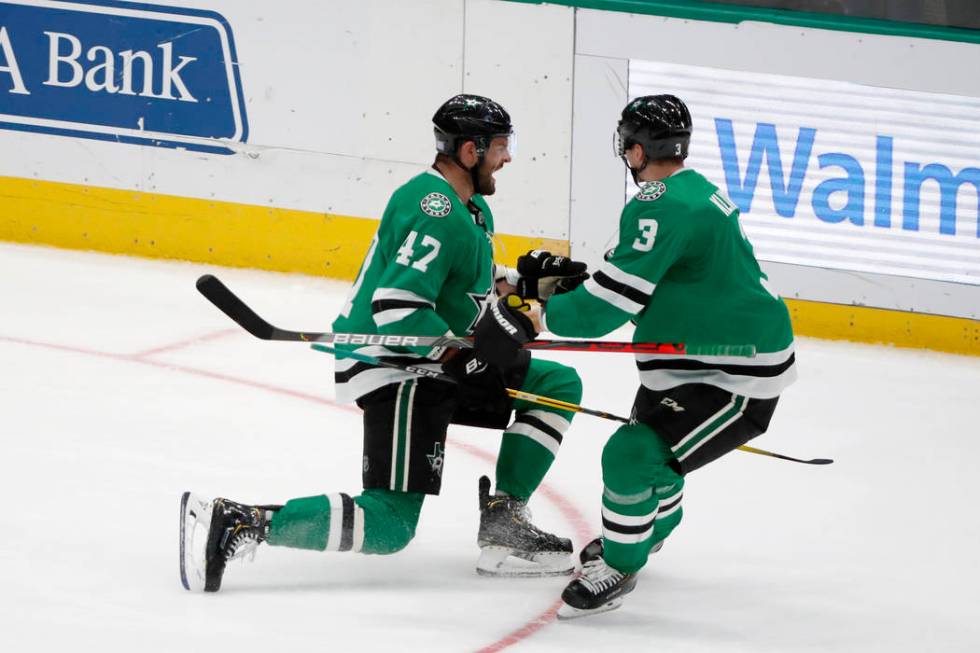 Dallas Stars right wing Alexander Radulov (47) celebrates scoring a goal with defenseman John K ...