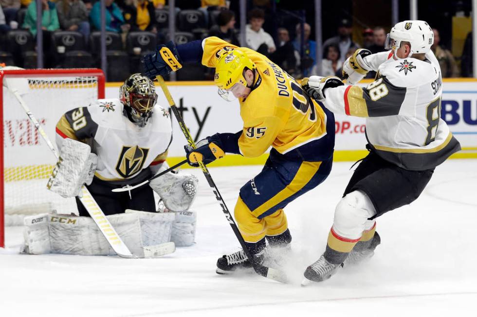 Nashville Predators center Matt Duchene (95) carries the puck between Vegas Golden Knights goal ...