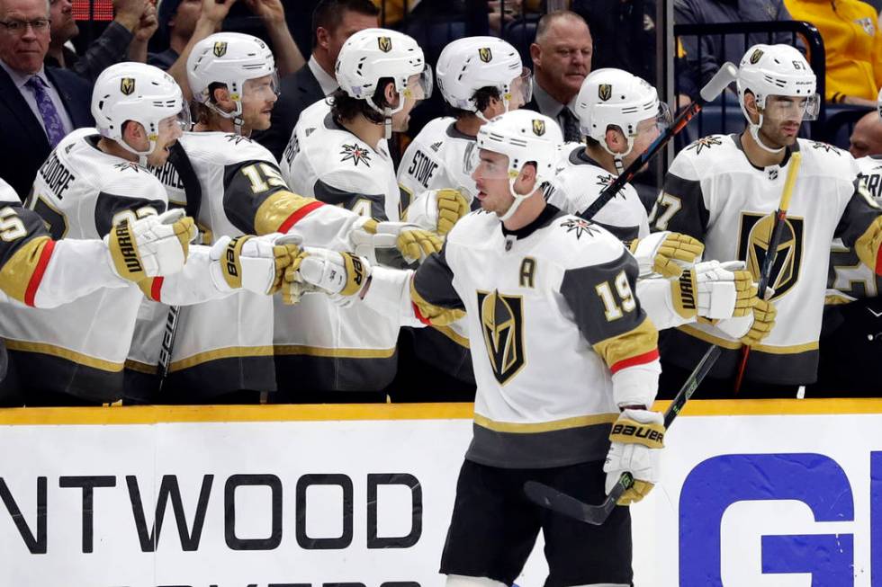 Vegas Golden Knights right wing Reilly Smith (19) is congratulated after scoring a goal against ...