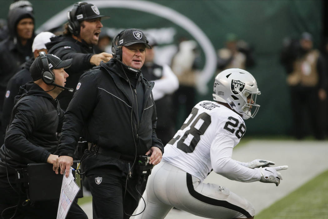 Oakland Raiders head coach Jon Gruden during the first half of an NFL football game against the ...